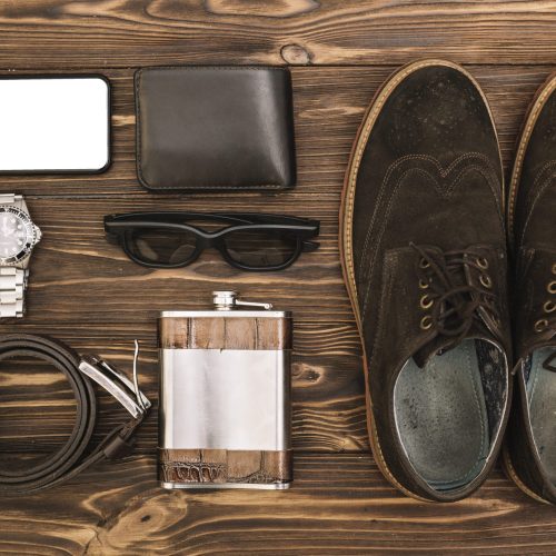 set-male-shoes-near-smartphone-accessories